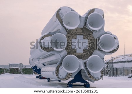 A rocket designed to launch a payload into outer space. A space rocket for delivering astronauts to the orbit of planet Earth. The nozzles of the launch vehicle. Space technology.