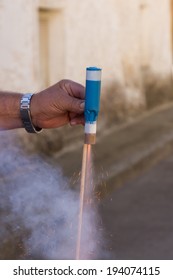 Rocket Firing A Pyrotechnic Show With Lit Fuse 