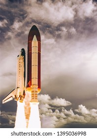 Rocket launch into dramatic sky. The elements of this image furnished by NASA.