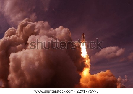 Rocket launch into outer space. Elements of this image furnished NASA. High quality photo