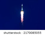 Rocket launch into space. Elements of this image furnished by NASA. High quality photo