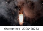 Rocket Launch at Night Powerful Takeoff with Fiery Engine and Sparking Embers. Space shuttle rocket launch concept wallpaper. Elements of this image furnished by NASA