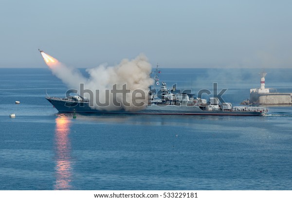 Rocket launch from warship. Start anti-ship\
missile from russian military\
cruiser