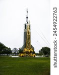 rocket model standing in the rain, johnson space center, houston, texas