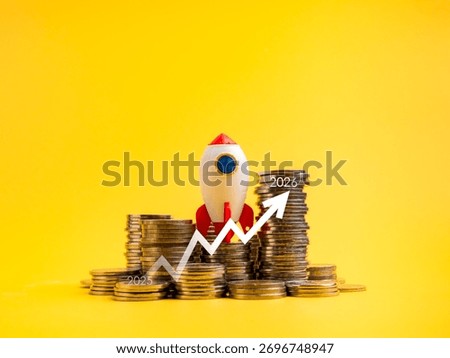 Rocket on stack of coins with upward arrow and 2025 to 2026 year growth chart. Concept of financial growth, investment success, economic planning, saving strategy, and wealth accumulation over time.