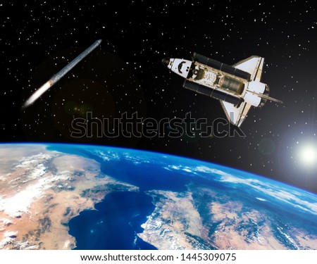 Rocket and shuttle flying in outer space. Space mission. The elements of this image furnished by NASA.