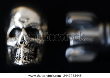 Rocket, skull, bullet. Objects isolated. Bullet, braincase on a black background. Metal objects. Scull, cranium, pericranium. Rocket, pellet, ball, missile.                      