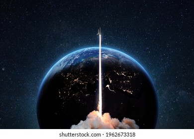 Rocket successful takeoff into deep starry space against the backdrop of the blue earth planet. Spaceship at launch from Earth, concept  - Shutterstock ID 1962673318