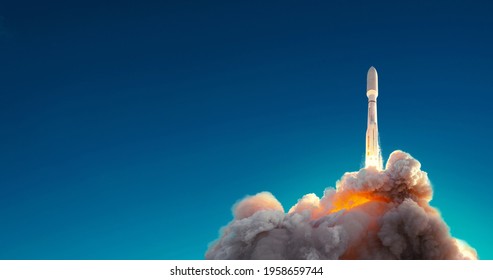 Rocket successfully launched into space against blue sky. Spaceship lift off