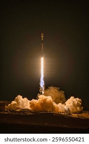 A rocket taking off from a rocket launch. A powerful rocket taking off into the sky, leaving behind a trail of smoke. Dramatic rocket launch. Take off. Elements of this image furnished by NASA