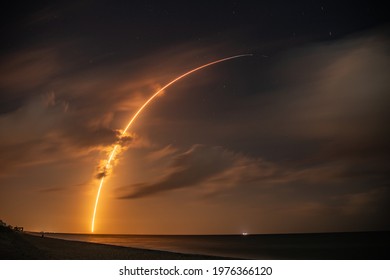 Rocket Trail Under Stars at Cape Canaveral - Powered by Shutterstock