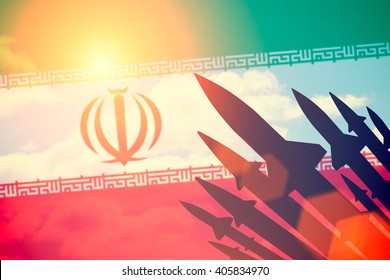 Rockets silhouettes background Iran flag. Toned