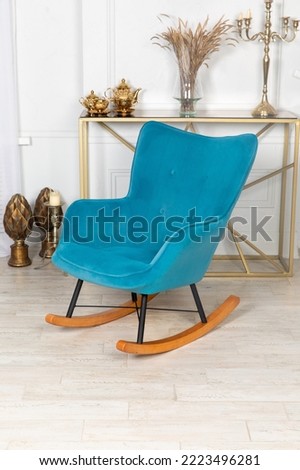 Rocking chair comfortable blue blue turquoise soft beautiful modern luxury elite luxury furniture sale shop production model white gray wall interior comfort wooden legs velvet unique new design brigh