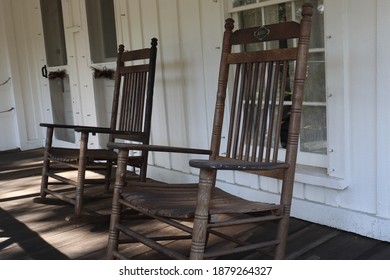 Rocking Chairs On Porch Of Old Farm House