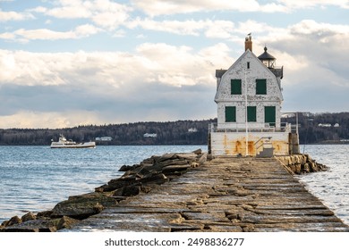 Rockland Harbor Breakwater Lighthouse is a historic lighthouse in Rockland, Maine's harbor. - Powered by Shutterstock