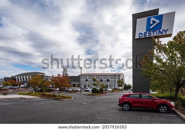 ROCKLIN, CA, U.S.A. - OCT. 13, 2021: Destiny Christian\
Church sign, with the campus in background The controversial church\
offers vaccine exemptions, and has been accused of violating IRS\
rules. 