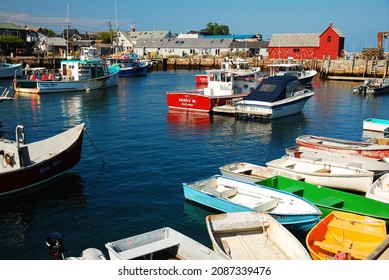 Rockport, MA, USA August 20 Lobster boats and dories are docked in a picturesque harbor in Rockport, Massachusetts