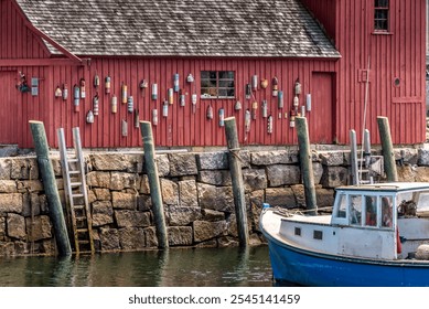 Rockport, MA USA Jun 5, 2015: Motif Number 1 is an iconic red fishing shack in the coastal town of Rockport. The most painted building ever, it has been a popular subject for artists and photographers - Powered by Shutterstock