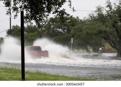 Rockport, Texas, USA—July 7, 2021: A Vehicle Travels Through Floodwaters During What The National Weather Service Declared A Flash Flood Emergency On July 7, 2021. 