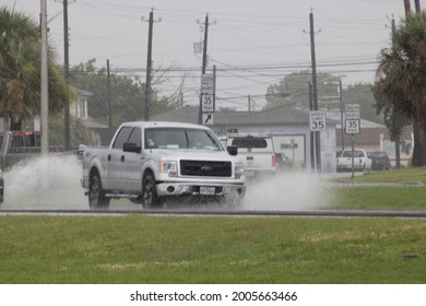 Rockport, Texas, USA—July 7, 2021: A Vehicle Travels Through Floodwaters During What The National Weather Service Declared A Flash Flood Emergency On July 7, 2021. 