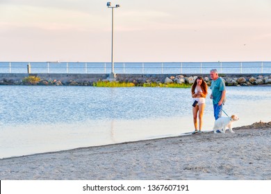 Rockport, Texas / USA - 7  April 2019:
Unidentified People Enjoying A Beautiful Sunset At The Beach.