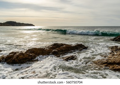 Rocks and breaking waves of Laguna Beach,California coastline
