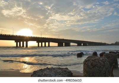 rocks and bridge at sunset