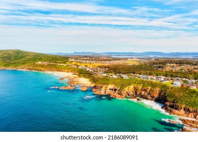 Rocks And Cliffs On Pacific Coast Around Burgess Beach In Forster Town Of Australia - Aerial Landscape View From Open Sea.