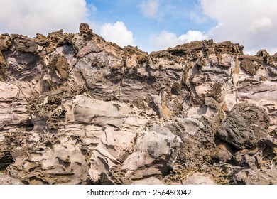 Rocks of the coast of the Easter Island, Chile - Shutterstock ID 256450042