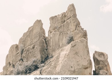 Rocks in the forest. Inaccessible boulders in the mountains. Ruins at the site of an ancient castle. Summer mountain landscape. - Shutterstock ID 2109021947