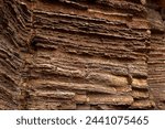 Rocks are naturally occurring solid aggregates of minerals, or in some cases, non-mineral solids like volcanic glass or coal. They are the fundamental units of Earth
