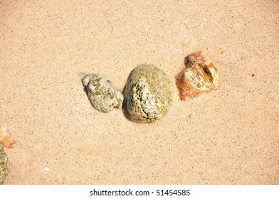 Rocks on Sandy Beach