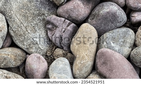 Rocks on shoreline of Lake McDonald in Glacier National Park