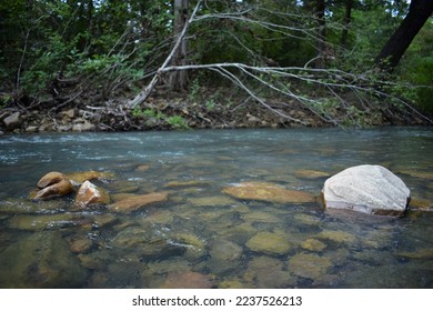Rocks in a Running Stream - Shutterstock ID 2237526213
