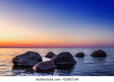 Rocks In The Sea At Sunset In Lahemaa Nature Park, Estonia