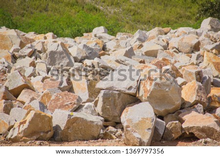Rocks. Rocks are solid masses that consist of the same minerals.  Or many species gather in nature, being hit by a small lump or decaying