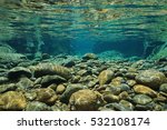 Rocks underwater on riverbed with clear freshwater, Dumbea river, Grande Terre, New Caledonia