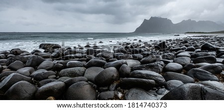 Rocks/stones on the Uttakleiv beach during a rainy day on the Lofoten islands, Norway