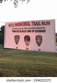 Rockwall, TX USA- September 11, 2019: Sign At The Start Of A Local 9/11 Memorial Race To Honor All New York First Responders Present At The World Trade Center Terrorist Attacks 