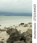 Rocky Beach Under Dramatic Cloudy Sky
Natural rocky beach landscape under a cloudy sky with moody atmosphere. Coastal scenery featuring stones along the shoreline and overcast weather, ideal for nature themes, travel concepts, climate visuals, and commercial video or photo projects.