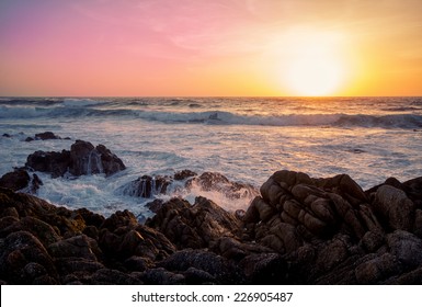 Rocky California coastline with pastel sky and sunset.  - Powered by Shutterstock