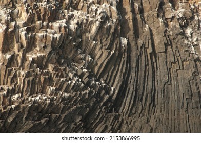 Rocky Cliff With Basalt Columns. Sarpan Island. Iles De La Madeleine National Park. Dakar. Senegal.