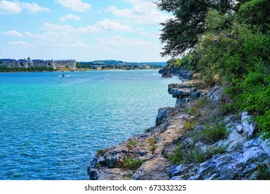 A Rocky Cliff On The Banks Of Lake Travis Where You Can Boat, Canoe, Kayak And Just Have A Great Day Of Fun.