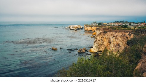 Rocky Cliffs At Sunse And Silhouette Of A Beautiful Beach Town.. Shell Beach At Pismo Beach, California Central Coast