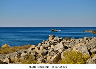 rocky coast and the fisherman boat - Powered by Shutterstock