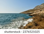 rocky coast kalymnos island greece sumer sun aegean . High quality photo