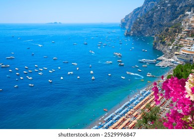 Rocky coast and Tyrrhenian Sea blue waters near Positano, Amalfi coast Italy - Powered by Shutterstock