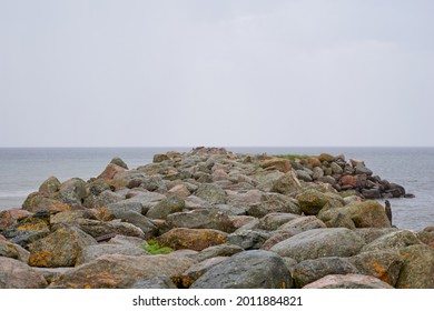 Rocky Coastal Landscape Scene At Shore Of Ocean. High Quality Photo