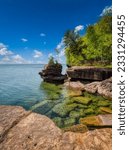 Rocky coastline of Lake Superior in Big Bay State Park in La Pointe on Madeline Island in the Apostle Islands National Lakeshore in Wisconsin USA