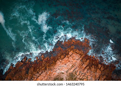 Rocky coastline meets the ocean in South Africa - Powered by Shutterstock